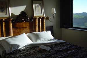 Superior double with panoramic view, private facilities (bath), and breakfast